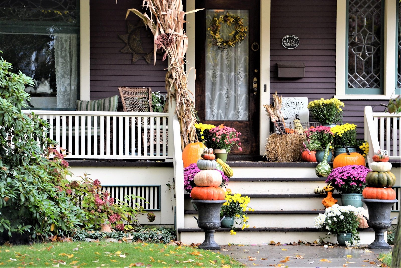 Front porch with fall pumpkins and decor